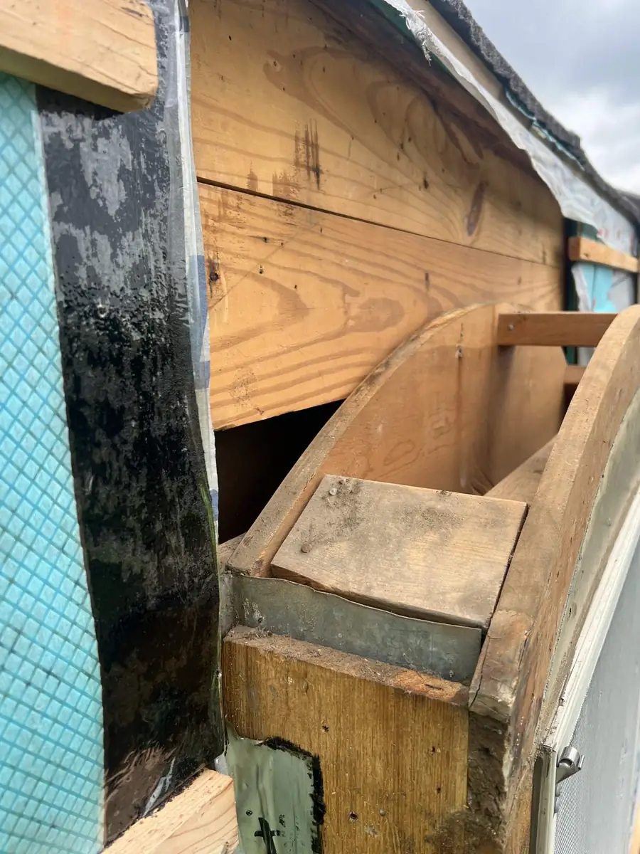 Old roof stripped to the deck with soft boards replaced